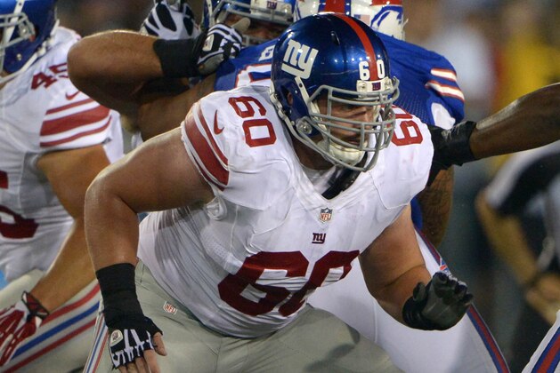Aug 3, 2014; Canton, OH, USA; New York Giants center Weston Richburg (60) against the Buffalo Bills in the 2014 Hall of Fame game at Fawcett Stadium. Mandatory Credit: Kirby Lee-USA TODAY Sports