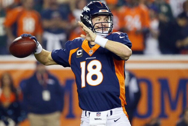 Denver Broncos quarterback Peyton Manning (18) throws against the Green Bay Packers during the first half of an NFL football game, Sunday, Nov. 1, 2015, in Denver. (AP Photo/Jack Dempsey)