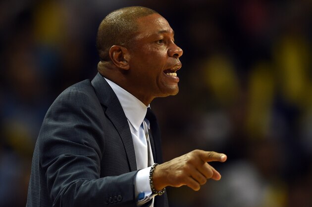 In this photo taken on October 14, 2015, Doc Rivers, head coach of the Los Angeles Clippers, talks to his team during the 2015 NBA Global Games China pre-season basketball match between the Charlotte Hornets and Los Angeles Clippers in Shanghai.     AFP PHOTO / JOHANNES EISELE        (Photo credit should read JOHANNES EISELE/AFP/Getty Images)
