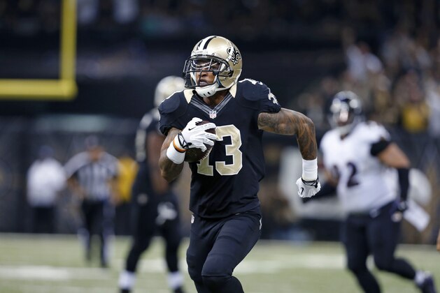New Orleans Saints wide receiver Joe Morgan (13) carries for a long gain to near the end zone in the first half an NFL football game against the Baltimore Ravens in New Orleans, Monday, Nov. 24, 2014. (AP Photo/Jonathan Bachman)