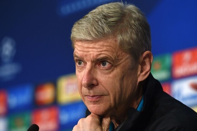 Arsenal's French head coach Arsene Wenger laughs addresses a press conference on the eve of the UEFA Champions League Group F second-leg football match between Bayern Munich and Arsenal FC in Munich, southern Germany, on November 3, 2015.  AFP PHOTO / CHRISTOF STACHE        (Photo credit should read CHRISTOF STACHE/AFP/Getty Images)