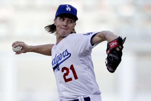 Los Angeles Dodgers starting pitcher Zack Greinke works against a New York Mets batter during the first inning in Game 5 of baseball's National League Division Series Thursday, Oct. 15, 2015, in Los Angeles. (AP Photo/Gregory Bull)