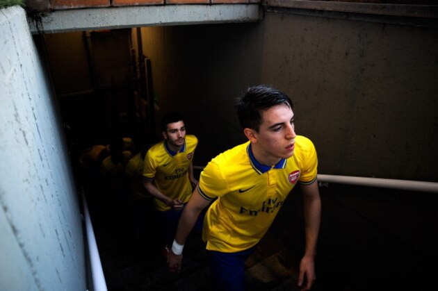 BARCELONA, SPAIN - MARCH 18:  Julio Pleguezuelo of Arsenal walks out onto the pitch prior to the UEFA Youth League Quarter FInal match between FC Barcelona U19 and Arsenal U19 at Mini Estadi on March 18, 2014 in Barcelona, Spain.  (Photo by David Ramos/Getty Images)