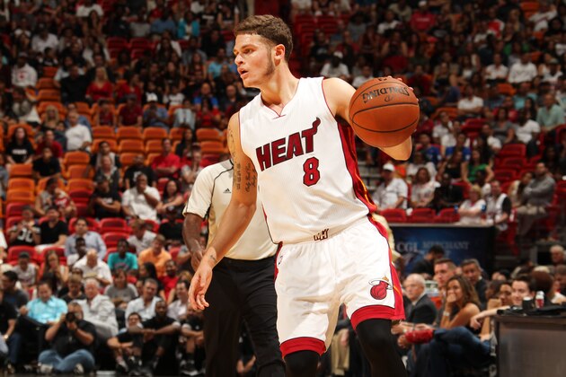 MIAMI, FL - OCTOBER 12: Tyler Johnson #8 of the Miami Heat drives to the basket against the San Antonio Spurs during a preseason game on October 12, 2015 at AmericanAirlines Arena in Miami, Florida. NOTE TO USER:  User expressly acknowledges and agrees that, by downloading and or using this Photograph, user is consenting to the terms and conditions of the Getty Images License Agreement.  Mandatory Copyright Notice:  Copyright 2015 NBAE (Photo by Issac Baldizon/NBAE via Getty Images)