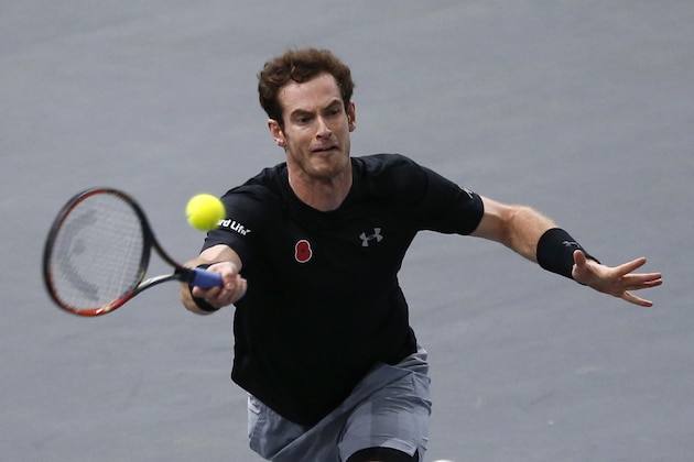 Britain's Andy Murray returns the ball to Borna Coric of Croatia, during their second round match of the BNP Masters tennis tournament, at the Paris refurbished Bercy Arena, in Paris, France, Wednesday, Nov. 4, 2015. (AP Photo/Francois Mori)