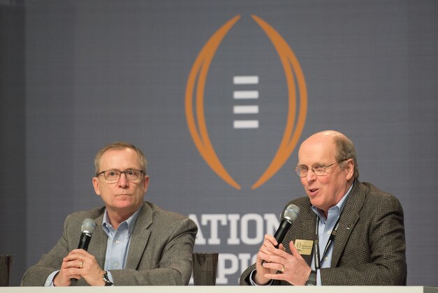 January 10, 2015; Arlington, TX, USA; College Football Playoff selection committee chairman Jeff Long (left) and executive director Bill Hancock (right) speak during fanfest at Dallas Convention Center. Mandatory Credit: Kyle Terada-USA TODAY Sports