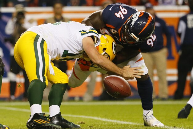Denver Broncos outside linebacker DeMarcus Ware (94) sacks Green Bay Packers quarterback Aaron Rodgers forcing a fumble during an NFL football game between the Denver Broncos and the Green Bay Packers, Sunday, Nov. 1, 2015, in Denver. (AP Photo/Jack Dempsey) Denver Broncos outside linebacker DeMarcus Ware (94) sacks Green Bay Packers quarterback Aaron Rodgers forcing a fumble during an NFL football game between the Denver Broncos and the Green Bay Packers, Sunday, Nov. 1, 2015, in Denver. (AP Photo/Jack Dempsey)