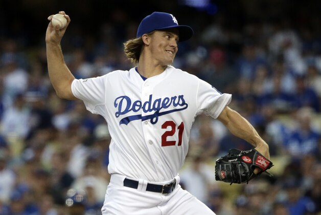 Los Angeles Dodgers starting pitcher Zack Greinke throws to the New York Mets during the first inning in Game 2 of baseball's National League Division Series, Saturday, Oct. 10, 2015 in Los Angeles. (AP Photo/Lenny Ignelzi)