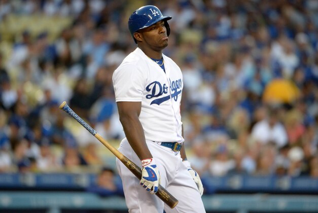 Jun 18, 2015; Los Angeles, CA, USA; Los Angeles Dodgers right fielder Yasiel Puig (66) reacts after striking out against the Texas Rangers at Dodger Stadium. Mandatory Credit: Kirby Lee-USA TODAY Sports Jun 18, 2015; Los Angeles, CA, USA; Los Angeles Dodgers right fielder Yasiel Puig (66) reacts after striking out against the Texas Rangers at Dodger Stadium. Mandatory Credit: Kirby Lee-USA TODAY Sports