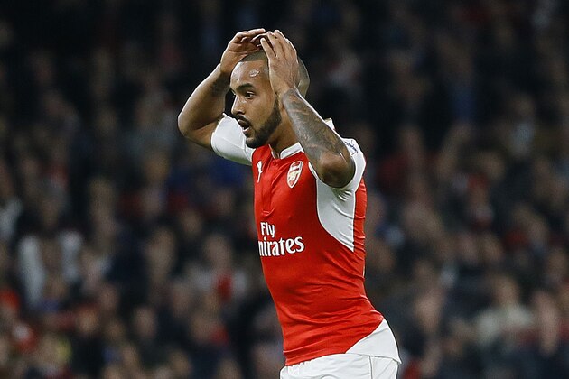 Arsenal's Theo Walcott reacts to a missed chance during the Champions League Group F soccer match between Arsenal and Bayern Munich at Emirates stadium in London Tuesday, Oct. 20, 2015. (AP Photo/Kirsty Wigglesworth)