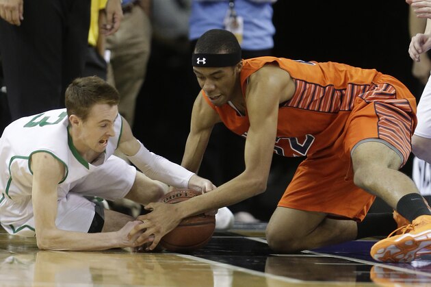 Sir Francis Drake's Miles Phillips, left, and Chaminade's Trevor Stanback dive for the ball during the fourth quarter of the boys' Division 3 CIF basketball championship game Friday, March 28, 2014 in Sacramento, Calif. Chaminade won 71-51 .(AP Photo/Rich Pedroncelli)