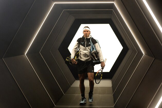 Spain's Rafael Nadal arrives on court for his second round tennis match against Czech Republic's Lukas Rosol at the ATP World Tour Masters 1000 indoor tennis tournament in Paris on November 4, 2015. AFP PHOTO / MIGUEL MEDINA        (Photo credit should read MIGUEL MEDINA/AFP/Getty Images)