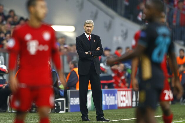 Arsenal's manager Arsene Wenger watches the Champions League Group F soccer match between Bayern Munich and Arsenal FC in Munich, southern Germany, Wednesday, Nov. 4, 2015. (AP Photo/Matthias Schrader) Arsenal's manager Arsene Wenger watches the Champions League Group F soccer match between Bayern Munich and Arsenal FC in Munich, southern Germany, Wednesday, Nov. 4, 2015. (AP Photo/Matthias Schrader)