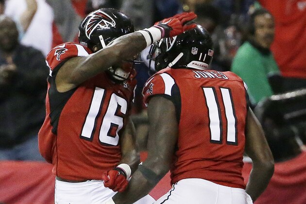 Atlanta Falcons wide receiver Julio Jones (11) celebrates his touchdown with Atlanta Falcons wide receiver Justin Hardy (16) during the second of an NFL football game against the Tampa Bay Buccaneers, Sunday, Nov. 1, 2015, in Atlanta. (AP Photo/David Goldman)