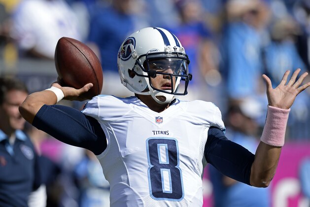 Tennessee Titans quarterback Marcus Mariota (8) warms up before an NFL football game against the Buffalo Bills, Sunday, Oct. 11, 2015, in Nashville, Tenn. (AP Photo/Mark Zaleski)