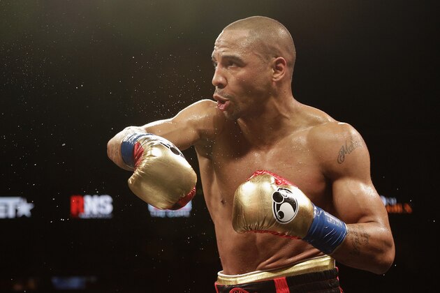 Andre Ward fights Paul Smith during a cruiserweight boxing match in Oakland, Calif., Saturday, June 20, 2015. Ward won by knockout in the ninth round when Smith's corner threw in the towel. (AP Photo/Jeff Chiu)