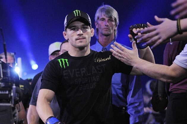 May 17, 2014; Southaven, MS, USA; Michael Chandler walks out before the fight against Will Brooks during a Bellator interim lightweight world championship bout during BFC 120 at Landers Center. Will Brooks defeats Michael Chandler by submission. Mandatory Credit: Justin Ford-USA TODAY Sports