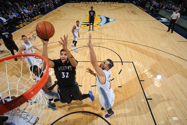 DENVER, CO - OCTOBER 30: Karl-Anthony Towns #32 of the Minnesota Timberwolves shoots the ball against the Denver Nuggetson October 30, 2015 at the Pepsi Center in Denver, Colorado. NOTE TO USER: User expressly acknowledges and agrees that, by downloading and/or using this Photograph, user is consenting to the terms and conditions of the Getty Images License Agreement. Mandatory Copyright Notice: Copyright 2015 NBAE (Photo by Garrett Ellwood/NBAE via Getty Images)