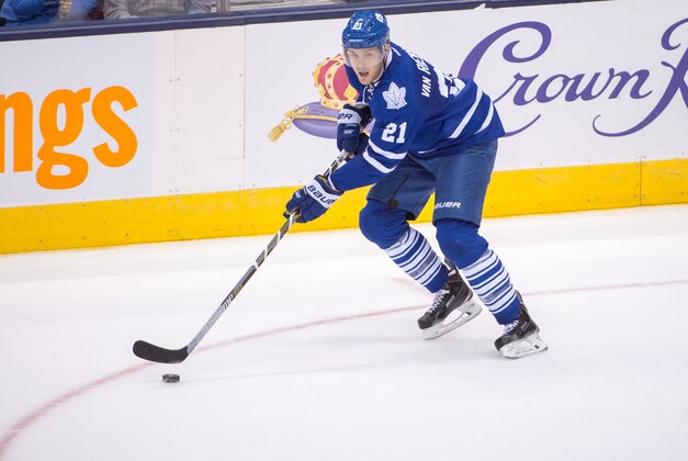 Oct 10, 2015; Toronto, Ontario, CAN; Toronto Maple left wing James van Riemsdyk (21) with the puck against Ottawa Senators in extra time at Air Canada Centre. Senators beat Leafs 5 - 4. Mandatory Credit: Peter Llewellyn-USA TODAY Sports