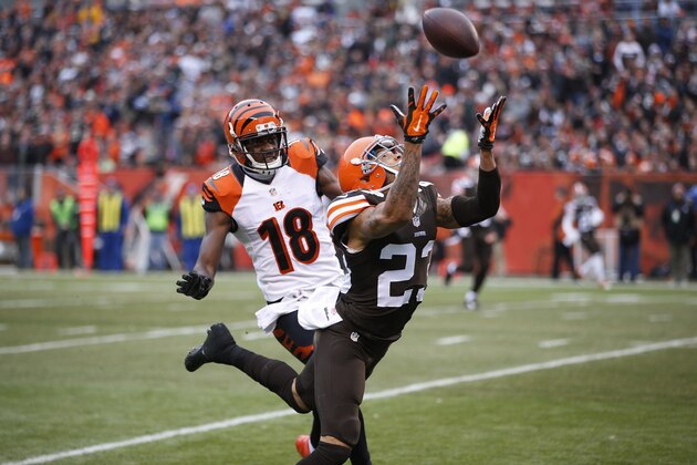 CLEVELAND, OH - DECEMBER 14: Joe Haden #23 of the Cleveland Browns defends a pass against A.J. Green #18 of the Cincinnati Bengals during the game at FirstEnergy Stadium on December 14, 2014 in Cleveland, Ohio. The Bengals defeated the Browns 30-0. (Photo by Joe Robbins/Getty Images)