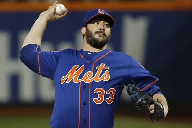 New York Mets pitcher Matt Harvey pitches during the first inning of Game 5 of the Major League Baseball World Series against the Kansas City Royals Sunday, Nov. 1, 2015, in New York. (AP Photo/Matt Slocum)