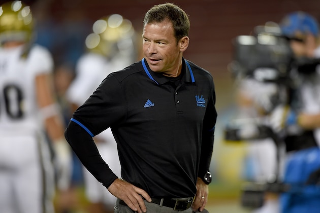 STANFORD, CA - OCTOBER 15:  Head coach Jim Mora of the UCLA Bruins looks on while his team warms up in pregame warm ups prior to playing the Stanford Cardinal at Stanford Stadium on October 15, 2015 in Stanford, California.  (Photo by Thearon W. Henderson/Getty Images)