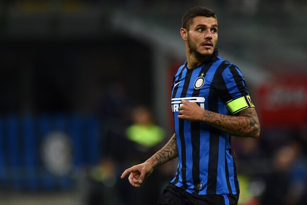 MILAN, ITALY - SEPTEMBER 23:  Mauro Icardi of Internazionale Milano in action during the Serie A match between FC Internazionale Milano and Hellas Verona FC at Stadio Giuseppe Meazza on September 23, 2015 in Milan, Italy.  (Photo by Tullio M. Puglia/Getty Images)