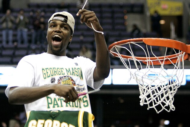 George Mason's Folarin Campbell cuts the net after beating Connecticut 86-84 in overtime during the fourth round of the NCAA basketball tournament in Washington, Sunday, March 26, 2006. (AP Photo/Haraz N. Ghanbari) George Mason's Folarin Campbell cuts the net after beating Connecticut 86-84 in overtime during the fourth round of the NCAA basketball tournament in Washington, Sunday, March 26, 2006. (AP Photo/Haraz N. Ghanbari)