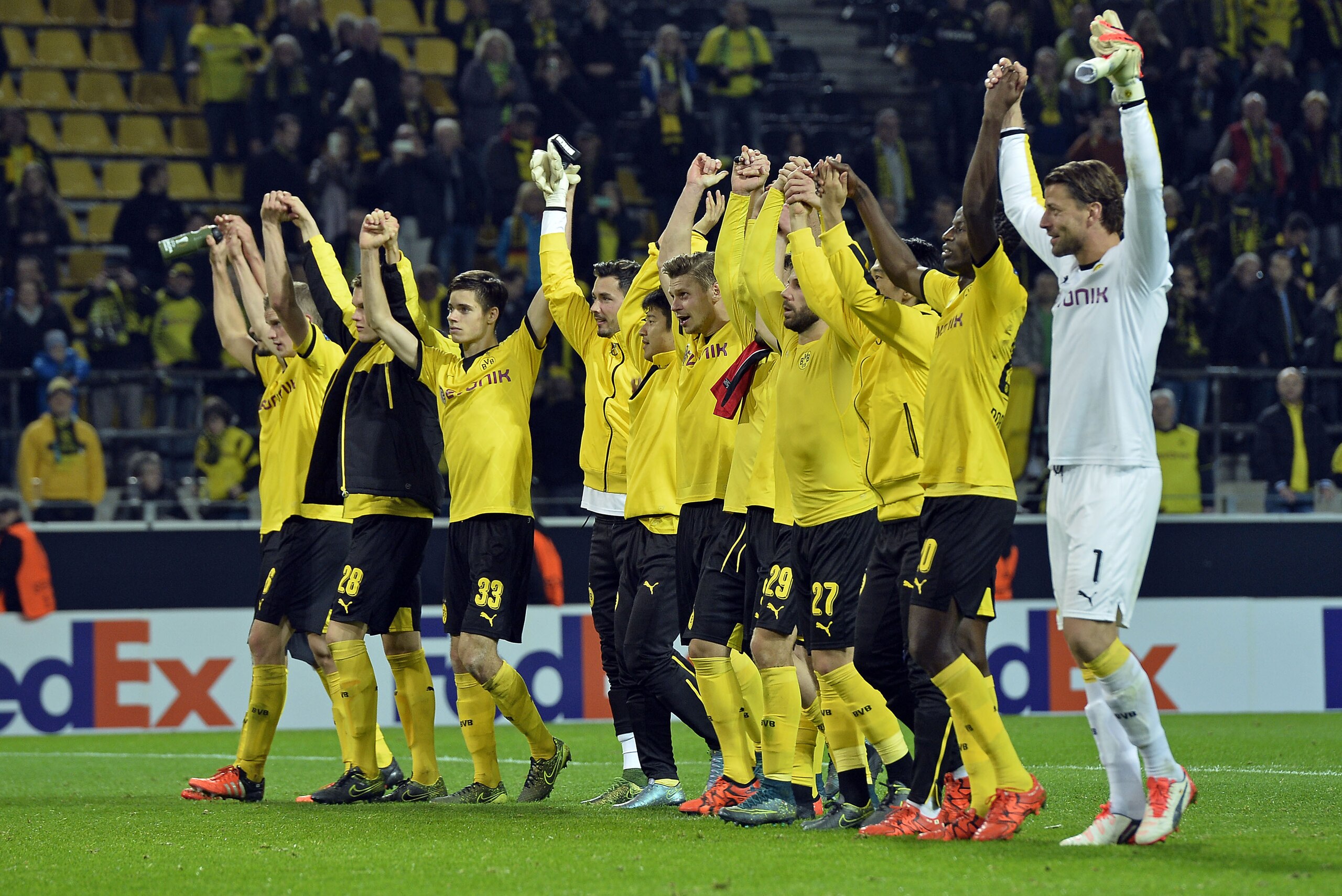 Dortmund's team celebrates with supporters after winning the Europa League group C soccer match between Borussia Dortmund and Qabala FC in Dortmund, Germany, Thursday, Nov. 5, 2015. Dortmund defeated Qabala with 4-0. (AP Photo/Martin Meissner)