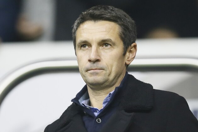 Aston Villa's newly appointed manager Remi Garde in the stands ahead of the English Premiership soccer match between Tottenham Hotspur and Aston Villa at White Hart Lane stadium in London, Monday, Nov. 2, 2015. (AP Photo/Kirsty Wigglesworth)