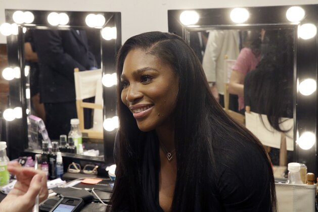 Serena Williams speaks to reporters after presenting the Serena Williams Spring 2016 collection during Fashion Week in New York, Tuesday, Sept. 15, 2015. (AP Photo/Mary Altaffer)
