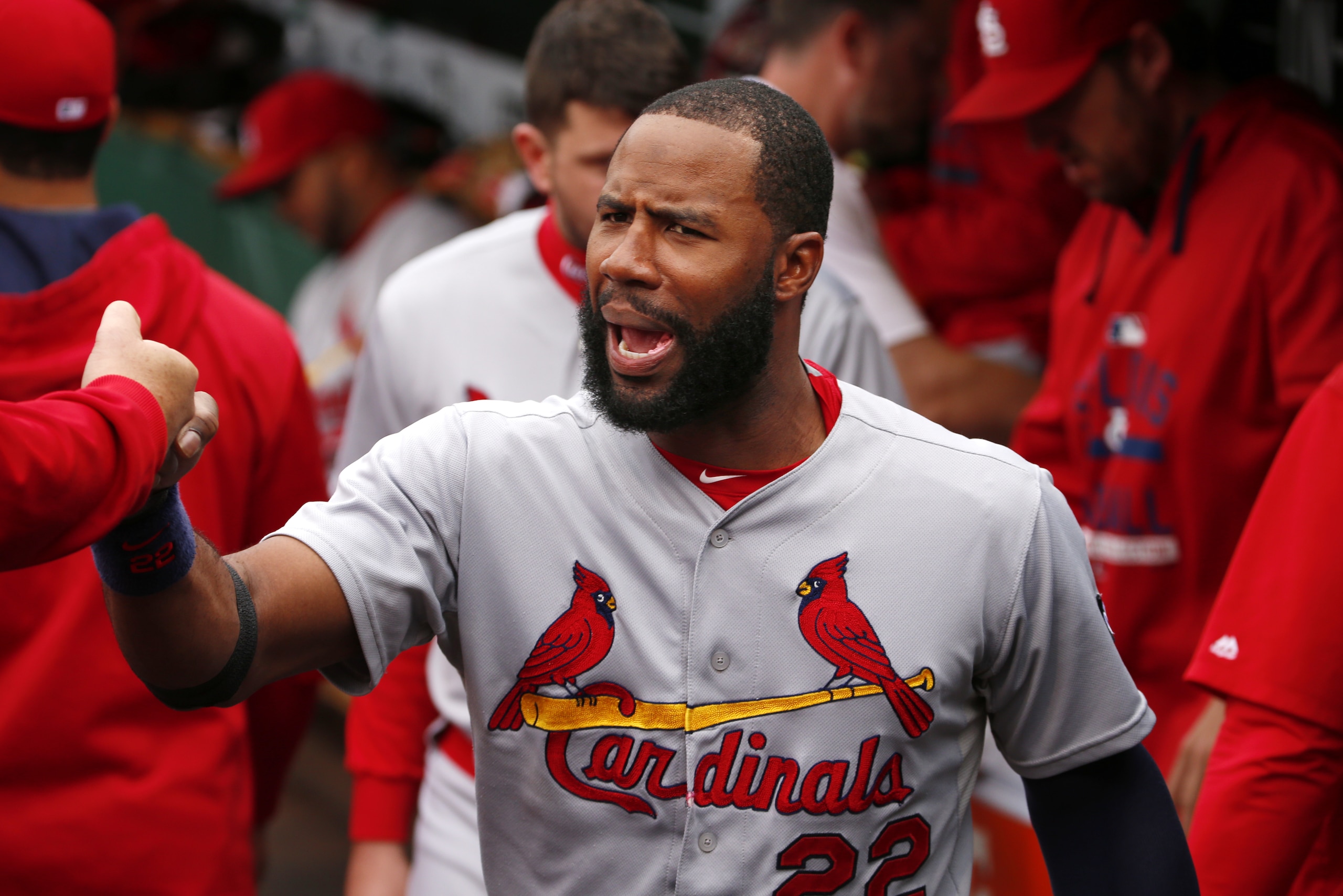 St. Louis Cardinals' Jason Heyward (22) walks through the dugout before a baseball game against the Pittsburgh Pirates in Pittsburgh, Wednesday, Sept. 30, 2015. (AP Photo/Gene J. Puskar)
