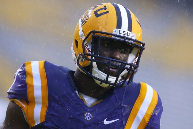LSU running back Leonard Fournette  warms up in the rain before an NCAA college football game against Western Kentucky in Baton Rouge, La., Saturday, Oct. 24, 2015. (AP Photo/Jonathan Bachman)