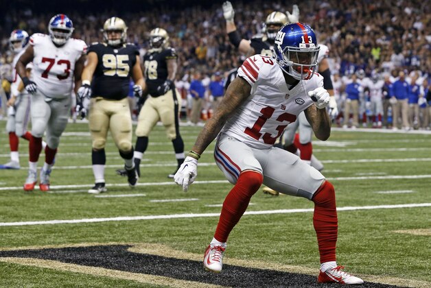 New York Giants wide receiver Odell Beckham (13) celebrates his touchdown reception in the first half of an NFL football game against the New Orleans Saints in New Orleans, Sunday, Nov. 1, 2015. (AP Photo/Jonathan Bachman)