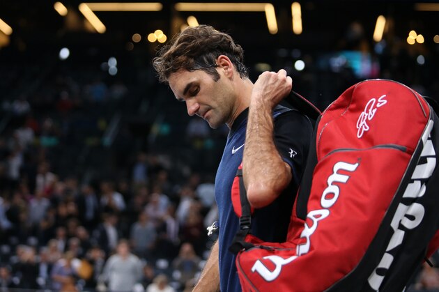 PARIS, FRANCE - NOVEMBER 5: Roger Federer of Switzerland leaves the court after losing against John Isner of USA in 3 sets during day 4 of the BNP Paribas Masters held at AccorHotels Arena on November 5, 2015 in Paris, France. (Photo by Jean Catuffe/Getty Images)