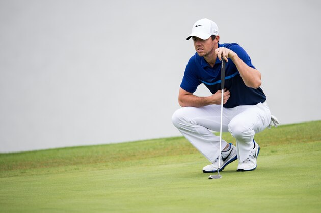 Rory McIlroy of Northern Ireland considers a shot during the WGC-HSBC Champions golf tournament in Shanghai on November 6, 2015. The WGC-HSBC Champions tournament takes place at Shanghai's Sheshan International Golf Club to November 8. AFP PHOTO / JOHANNES EISELE        (Photo credit should read JOHANNES EISELE/AFP/Getty Images)