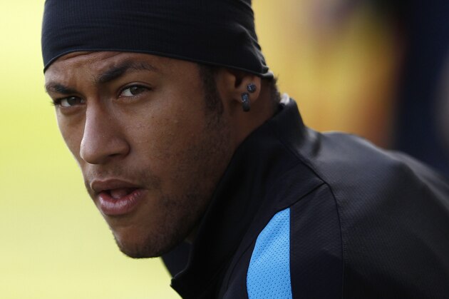 FC Barcelona's Neymar, from Brazil, looks on during a training session at the Sports Center FC Barcelona Joan Gamper in San Joan Despi, Spain, Tuesday, Nov. 3, 2015. FC Barcelona will play against BATE Borisov in a Champions League Group E soccer match on Wednesday. (AP Photo/Manu Fernandez)