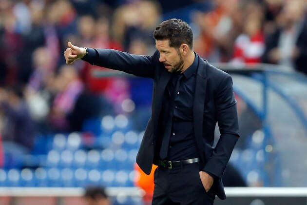 Atletico's coach Diego Simeone gestures during the Champions League group C soccer match between Atletico Madrid and Astana at the Vicente Calderon stadium in Madrid, Wednesday, Oct. 21, 2015.  (AP Photo/Daniel Ochoa de Olza)
