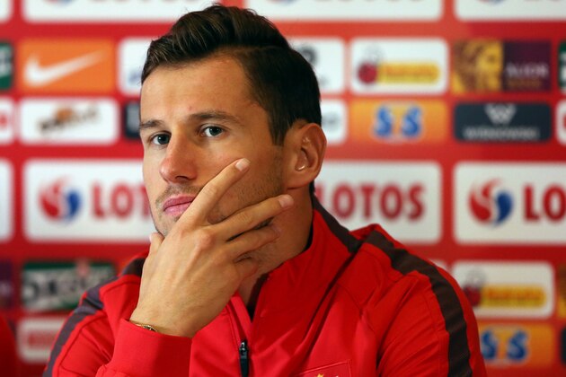 Poland's Grzegorz Krychowiak speaks to the media during a press conference in Glasgow, Scotland, Wednesday Oct. 7, 2015. Poland face Scotland in a Euro 2016 Group D qualifying soccer match on Thursday. (AP Photo/Scott Heppell)
