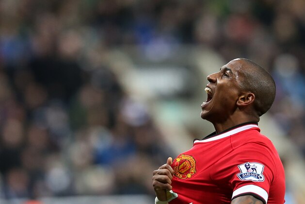 Manchester United's Ashley Young celebrates his goal during their English Premier League soccer match between Newcastle United and Manchester United at St James' Park, Newcastle, England, Wednesday, March, 4, 2015. (AP Photo/Scott Heppell)