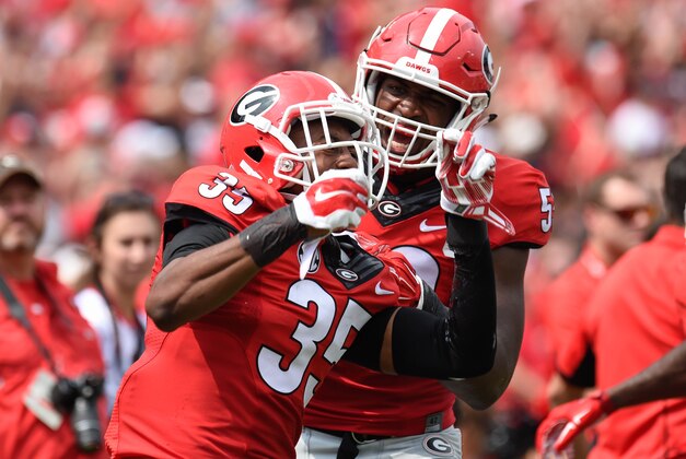 Sep 5, 2015; Athens, GA, USA; Georgia Bulldogs cornerback Aaron Davis (35) reacts with linebacker Jordan Jenkins (59) after intercepting a pass against the Louisiana Monroe Warhawks during the first half at Sanford Stadium. Mandatory Credit: Dale Zanine-USA TODAY Sports
