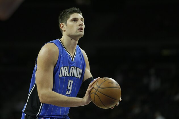 Orlando Magic center Nikola Vucevic prepares to shoot a free-throw during the second half of an NBA basketball game against the Detroit Pistons in Auburn Hills, Mich., Monday, Nov. 17, 2014. (AP Photo/Carlos Osorio)