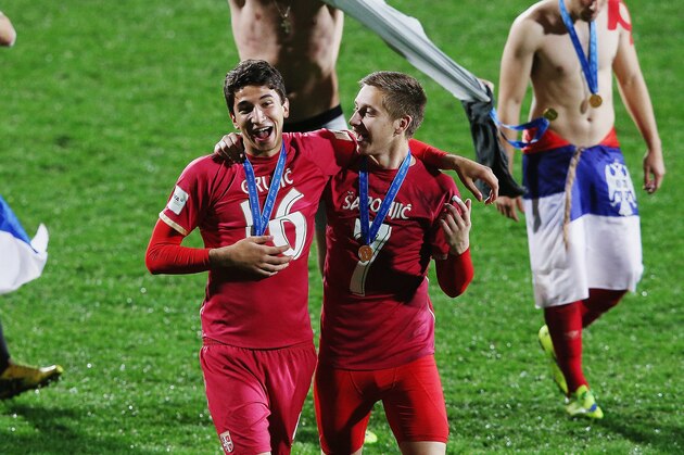 AUCKLAND, NEW ZEALAND - JUNE 20:  Marko Grujic of Serbia and Ivan Saponjic of Serbia celebrate after winning the FIFA U-20 World Cup Final match between Brazil and Serbia at North Harbour Stadium on June 20, 2015 in Auckland, New Zealand.  (Photo by Hannah Peters/Getty Images)