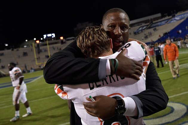 DURHAM, NC - OCTOBER 31: Interim head coach Larry Scott embraces Braxton Berrios #8 of the Miami Hurricanes after their game against the Duke Blue Devils at Wallace Wade Stadium on October 31, 2015 in Durham, North Carolina. Miami won 30-27 on a last-second touchdown. (Photo by Grant Halverson/Getty Images) DURHAM, NC - OCTOBER 31: Interim head coach Larry Scott embraces Braxton Berrios #8 of the Miami Hurricanes after their game against the Duke Blue Devils at Wallace Wade Stadium on October 31, 2015 in Durham, North Carolina. Miami won 30-27 on a last-second touchdown. (Photo by Grant Halverson/Getty Images)