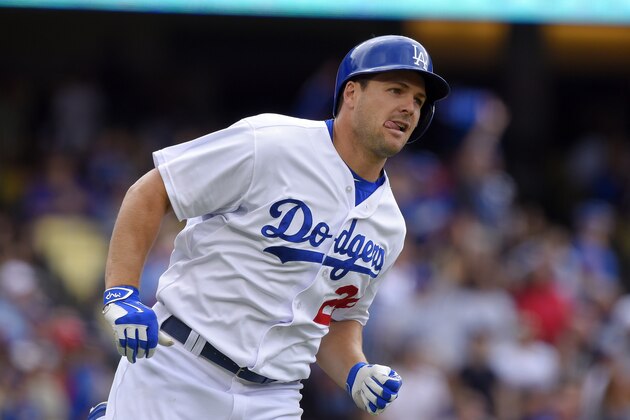 Los Angeles Dodgers' Chris Heisey runs to first after hitting a two-run home run during the sixth inning of a baseball game against the San Diego Padres, Sunday, Oct. 4, 2015, in Los Angeles. (AP Photo/Mark J. Terrill)