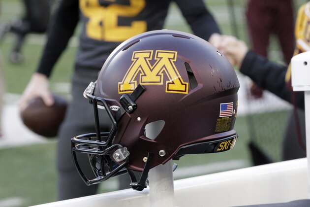 A Minnesota helmet sits on the sidelines during an NCAA college football game against Michigan, Saturday, Oct. 31, 2015 in Minneapolis. (AP Photo/Paul Battaglia)