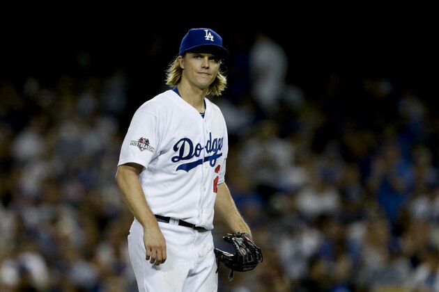 Los Angeles Dodgers starting pitcher Zack Greinke reacts as he leaves the game during the seventh inning in Game 5 of baseball's National League Division Series against the New York Mets Thursday, Oct. 15, 2015, in Los Angeles. (AP Photo/Alex Gallardo)