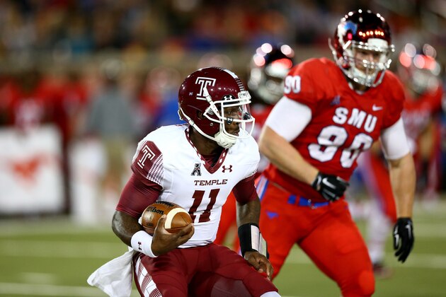 DALLAS, TX - NOVEMBER 06:  P.J. Walker #11 of the Temple Owls runs the ball against the Southern Methodist Mustangs in the first half at Gerald J. Ford Stadium on November 6, 2015 in Dallas, Texas.  (Photo by Ronald Martinez/Getty Images)
