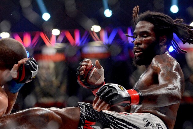 Nov 2, 2013; Long Beach, CA, USA;   Daniel Straus (red gloves) and Pat Curran (blue gloves) during their Bellator featherweight world championship fight at the Long Beach Arena. Daniel Strauss won by decision. Mandatory Credit: Jayne Kamin-Oncea-USA TODAY Sports