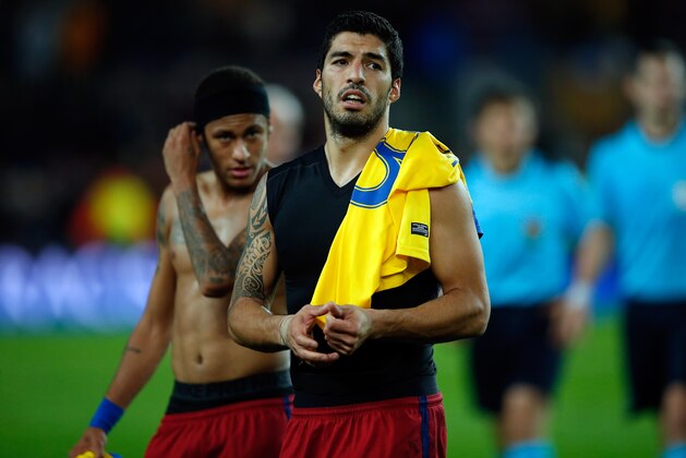 Barcelona's Luis Suarez and Neymar, left, leave the pitch at the end of the Champions League Group E soccer match between FC Barcelona and BATE Borisov at the Camp Nou stadium in Barcelona, Spain, Wednesday, Nov. 4, 2015. (AP Photo/Manu Fernandez)
